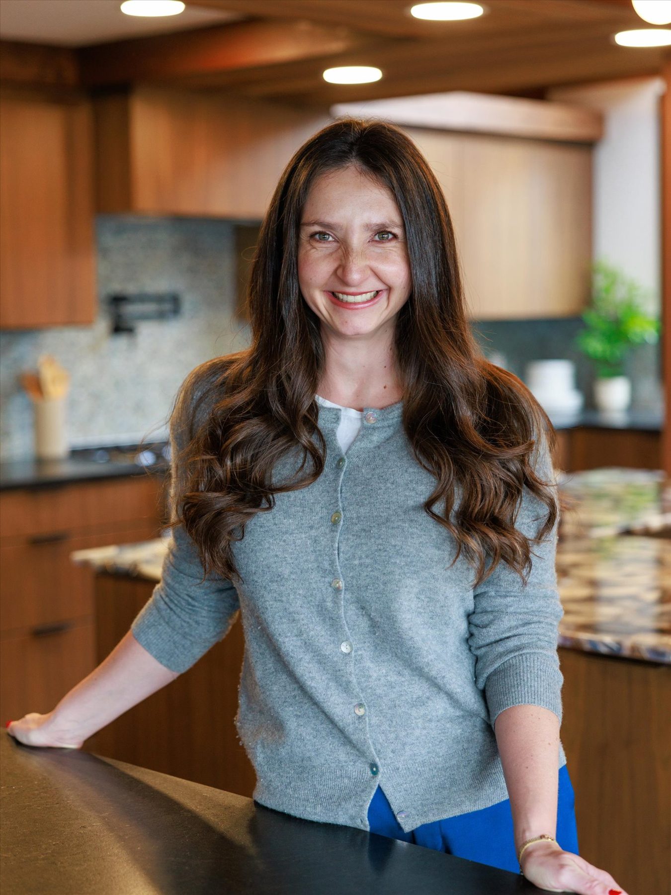 Alexandra Clouse in a modern kitchen