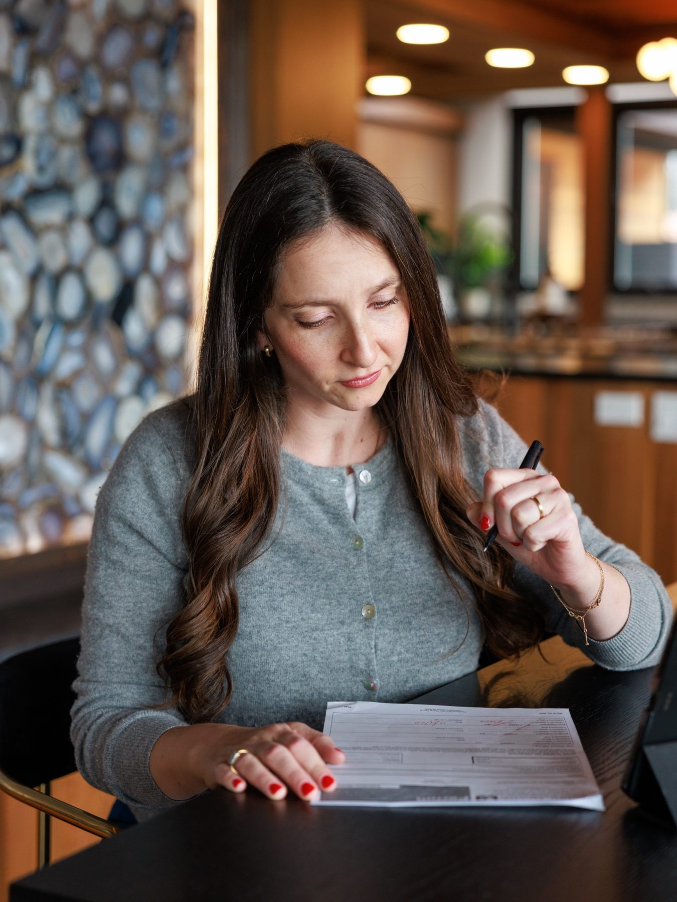Alexandra Clouse reviewing paperwork